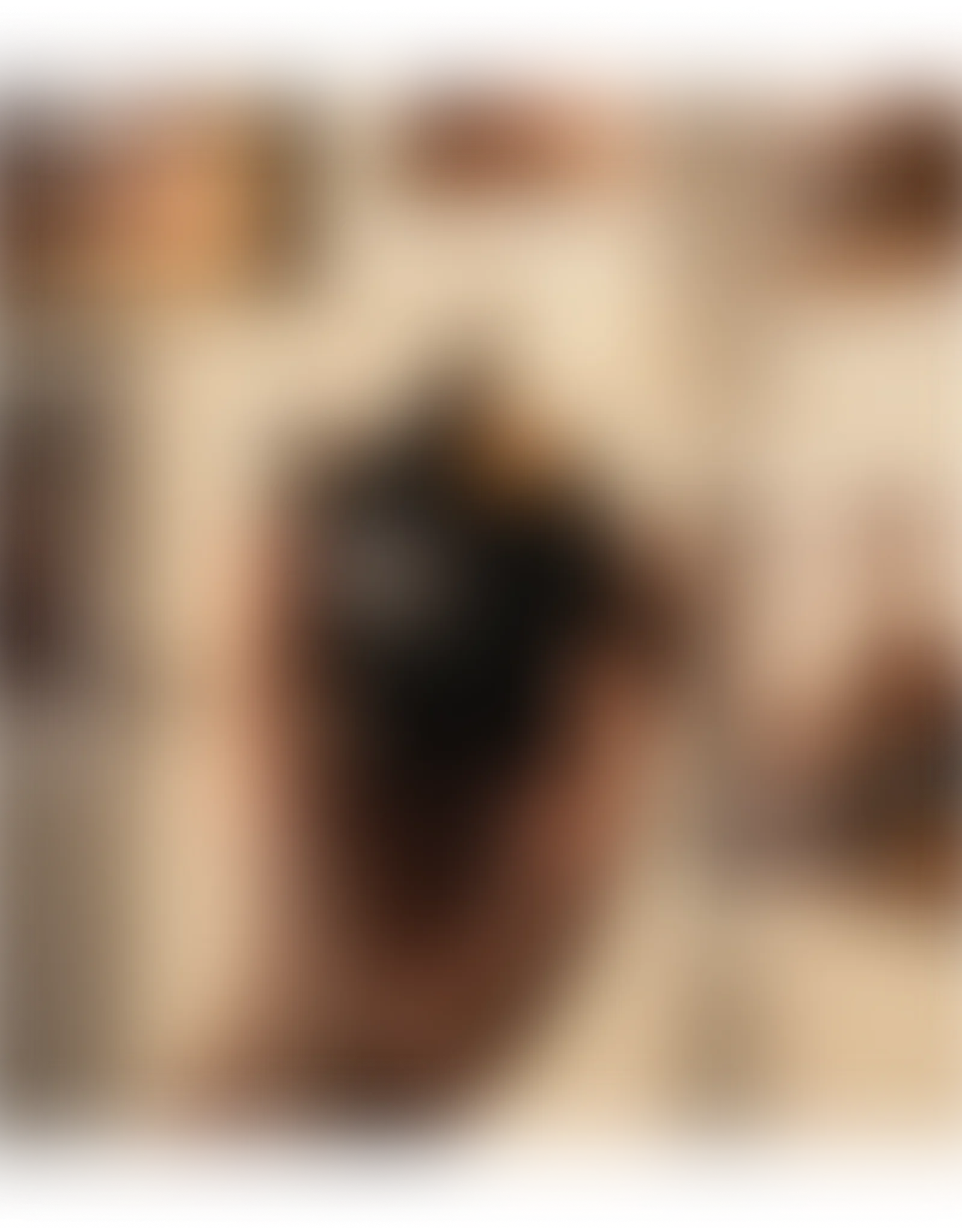 Blurred, dark abstract background with black framing.